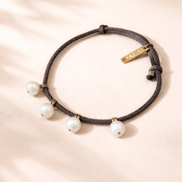 צמיד חבל פונפוני פנינים